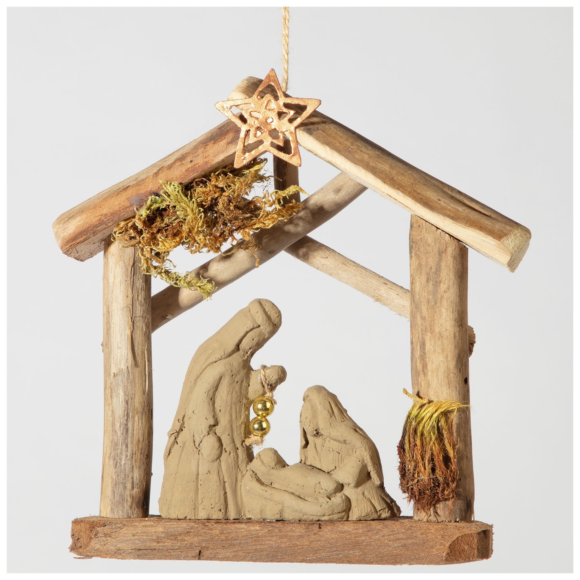 Recycled driftwood nativity ornament with clay figures and a hanging copper star, showcasing artisanal craftsmanship for eco-friendly holidays.