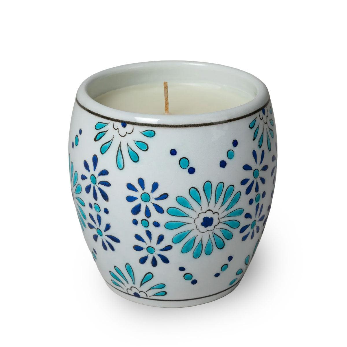 Ceramic candle holder with blue floral patterns on a white background