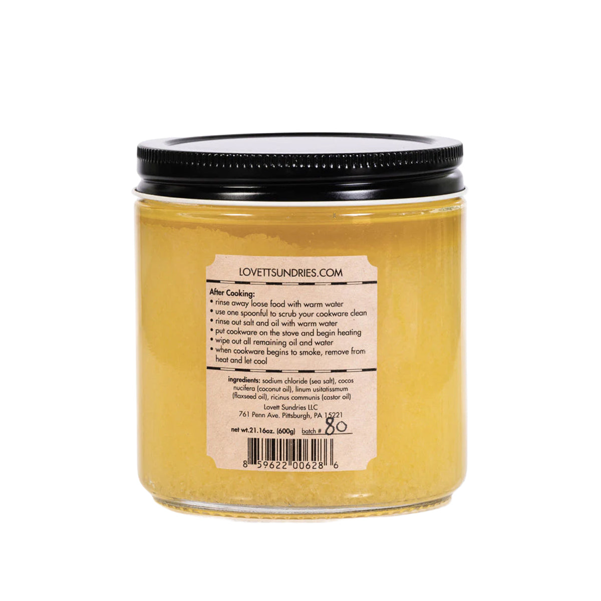 A jar of Cast Iron Conditioner is viewed from the back. The label provides "After Cooking" instructions and lists the ingredients: sodium chloride, cocos nucifera, linum usitatissimum and ricinus communis.