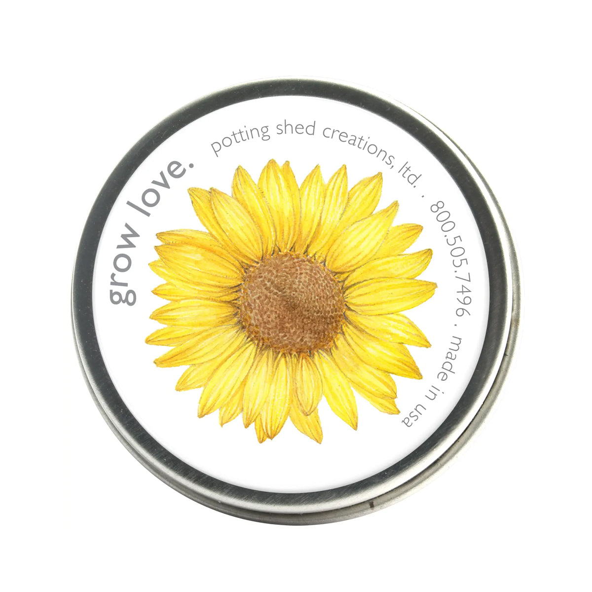 A circular garden sprinkles tin with a beautiful yellow sunflower illustration on the lid. The text "grow love" is visible on top.