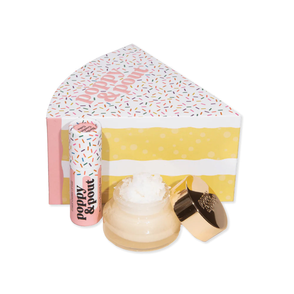 Cosmetic set with a cream product and applicator, branded 'Poppy & Pout', on a white background.