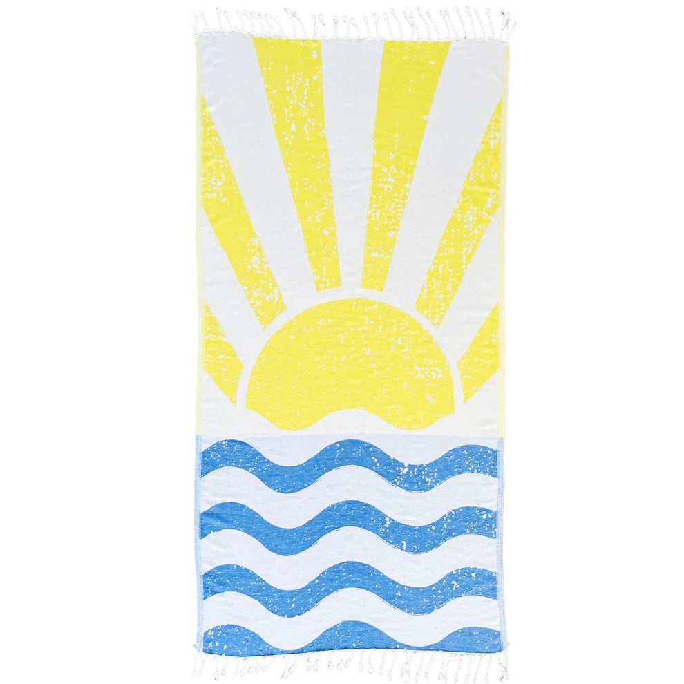 Bright yellow and blue sunrise Turkish cotton beach towel with sun and wave illustrations, fair trade and quick-drying.