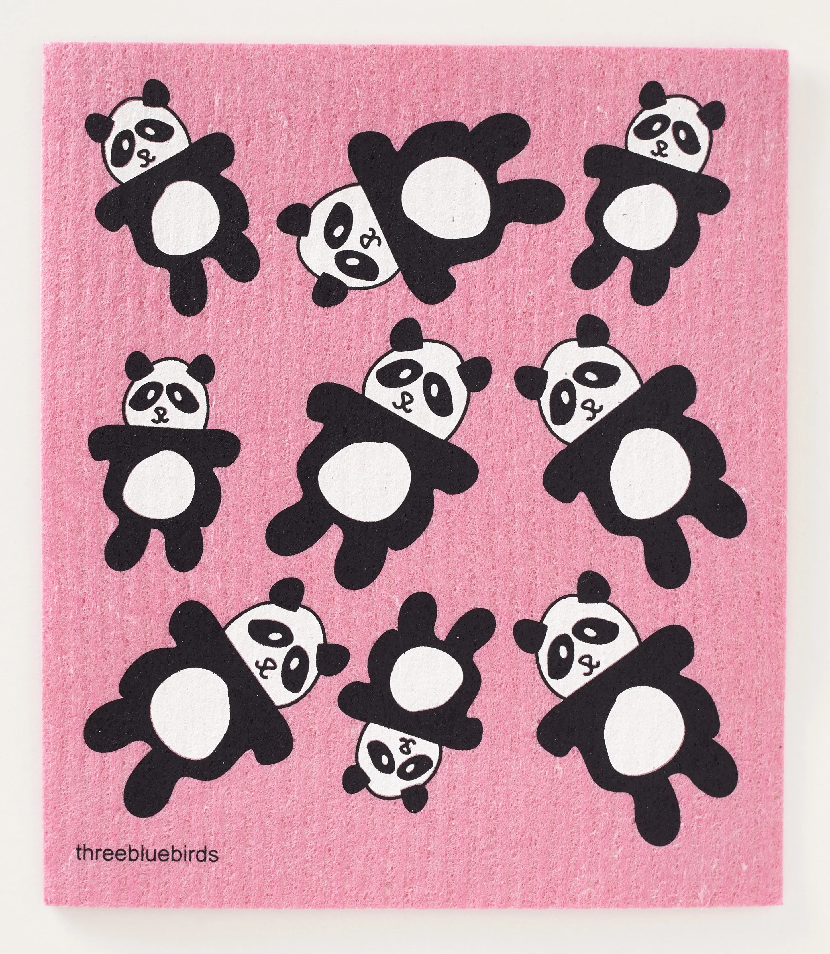 Adorable Swedish dishcloth with a delightful pattern of black and white pandas in a pink background