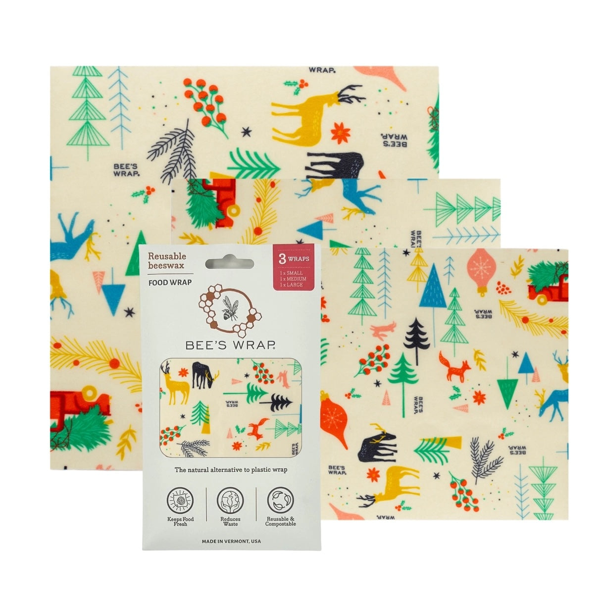 Packaged beeswax food wraps with colorful forest animals, trees, and berries print in small, medium, and large sizes.
